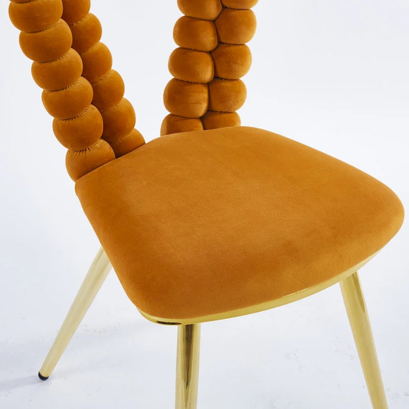 Fauteuil d'appoint rembourré dossier bullé avec pieds en métal doré