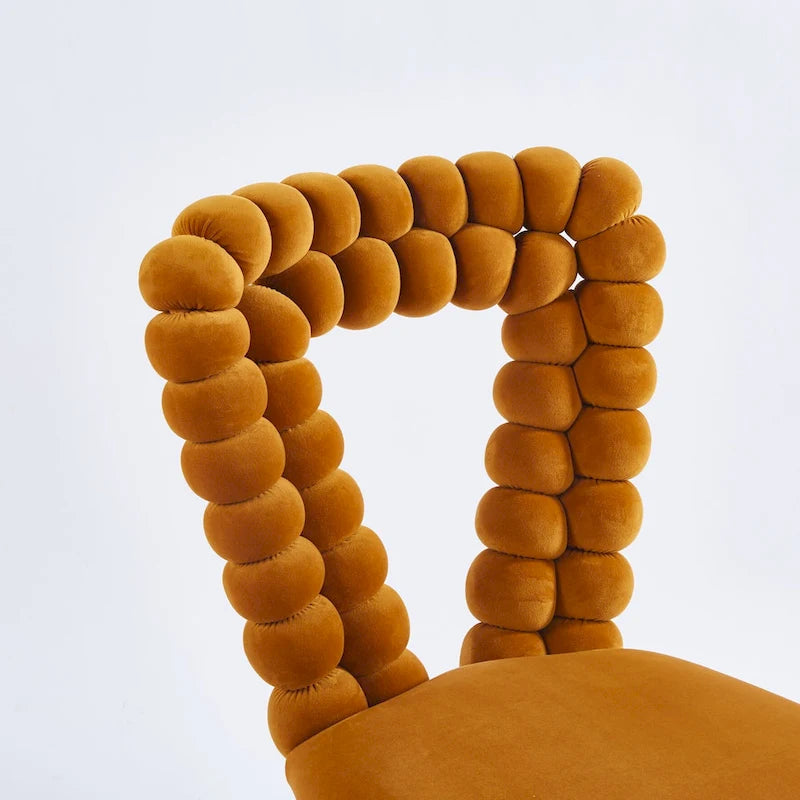 Fauteuil d'appoint rembourré dossier bullé avec pieds en métal doré