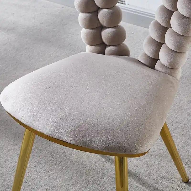 Fauteuil d'appoint rembourré dossier bullé avec pieds en métal doré