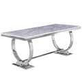 Table à manger plateau en faux marbre avec piètement en U en acier inoxydable poli