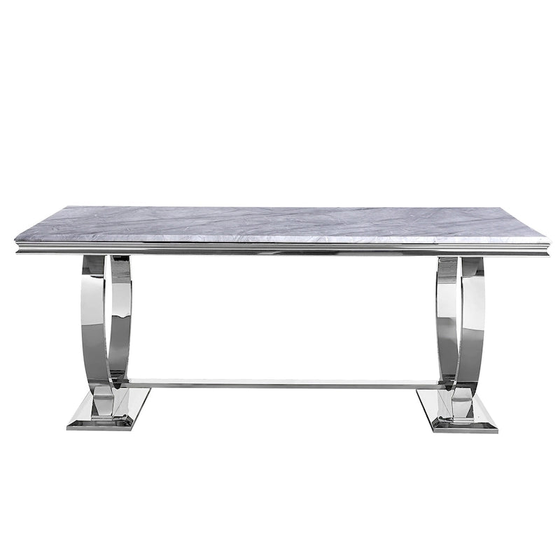 Table à manger plateau en faux marbre avec piètement en U en acier inoxydable poli