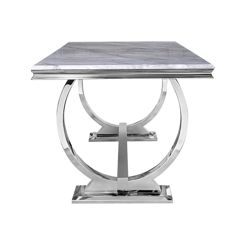Table à manger plateau en faux marbre avec piètement en U en acier inoxydable poli