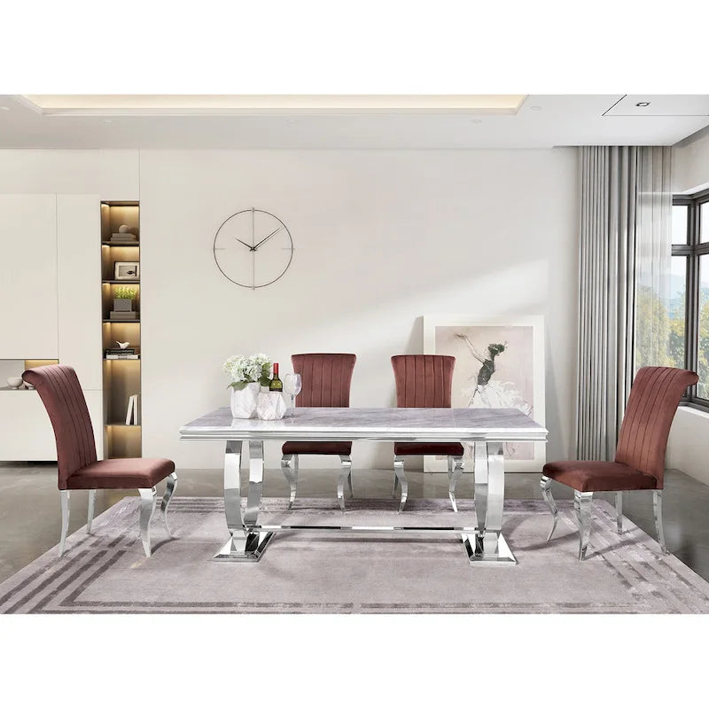 Table à manger plateau en faux marbre avec piètement en U en acier inoxydable poli