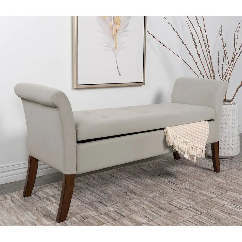 Banc de rangement en velours capitonné avec accoudoirs roulés et pieds en bois