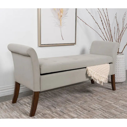 Banc de rangement en velours capitonné avec accoudoirs roulés et pieds en bois