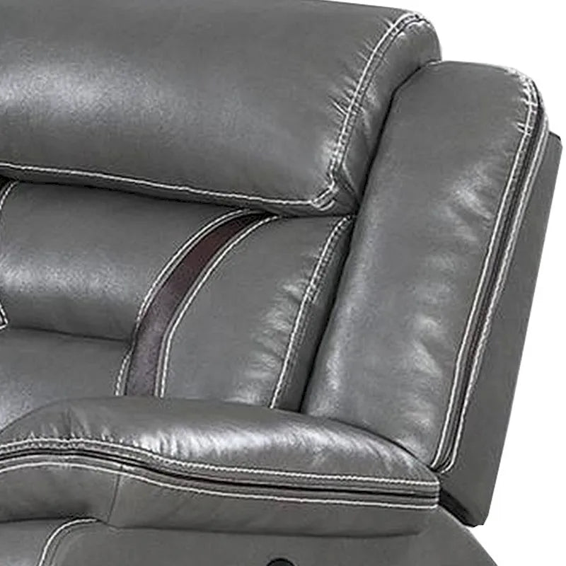 Canapé inclinable électrique gris avec accoudoirs coussins et surpiqûres contrastantes