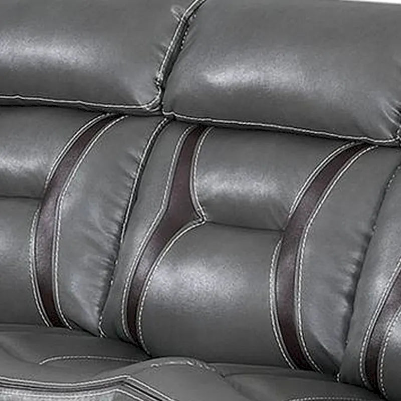 Canapé inclinable électrique gris avec accoudoirs coussins et surpiqûres contrastantes