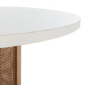 Table à manger ronde avec plateau en marbre blanc et piètement hexagonal en rotin