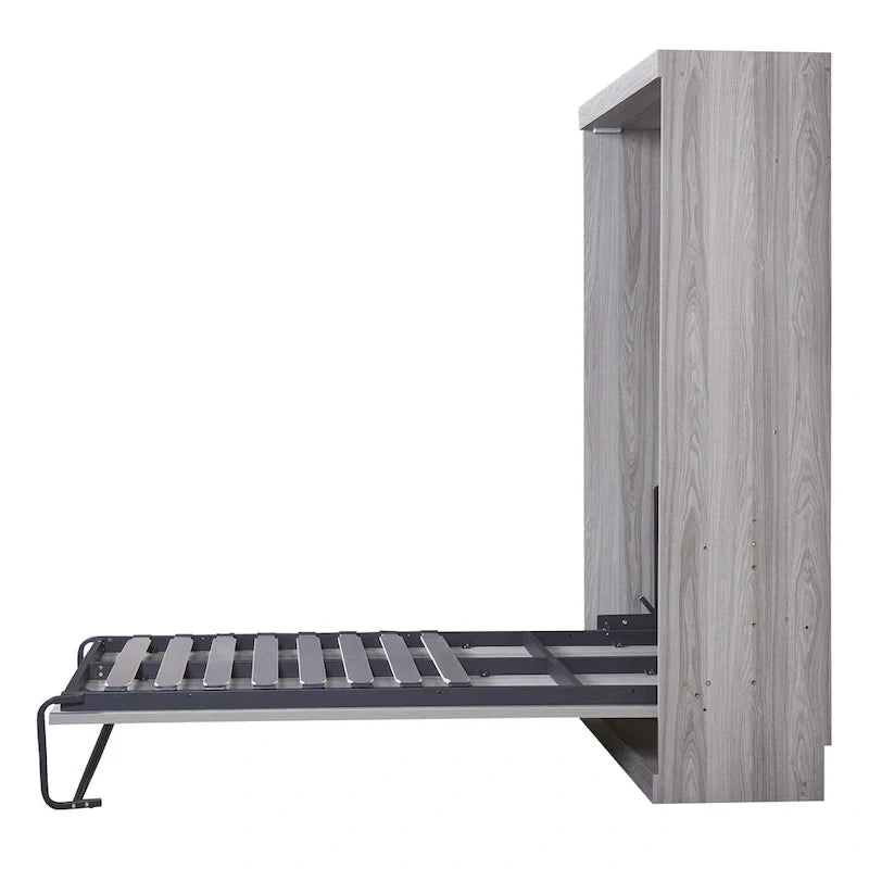 Le lit escamotable en bois peut être replié dans une armoire